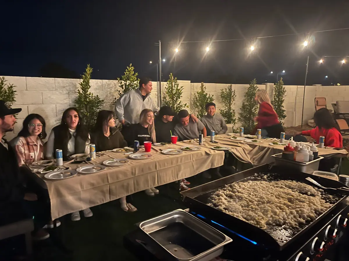 Guests watching the chef cook at a Los Angeles hibachi party
